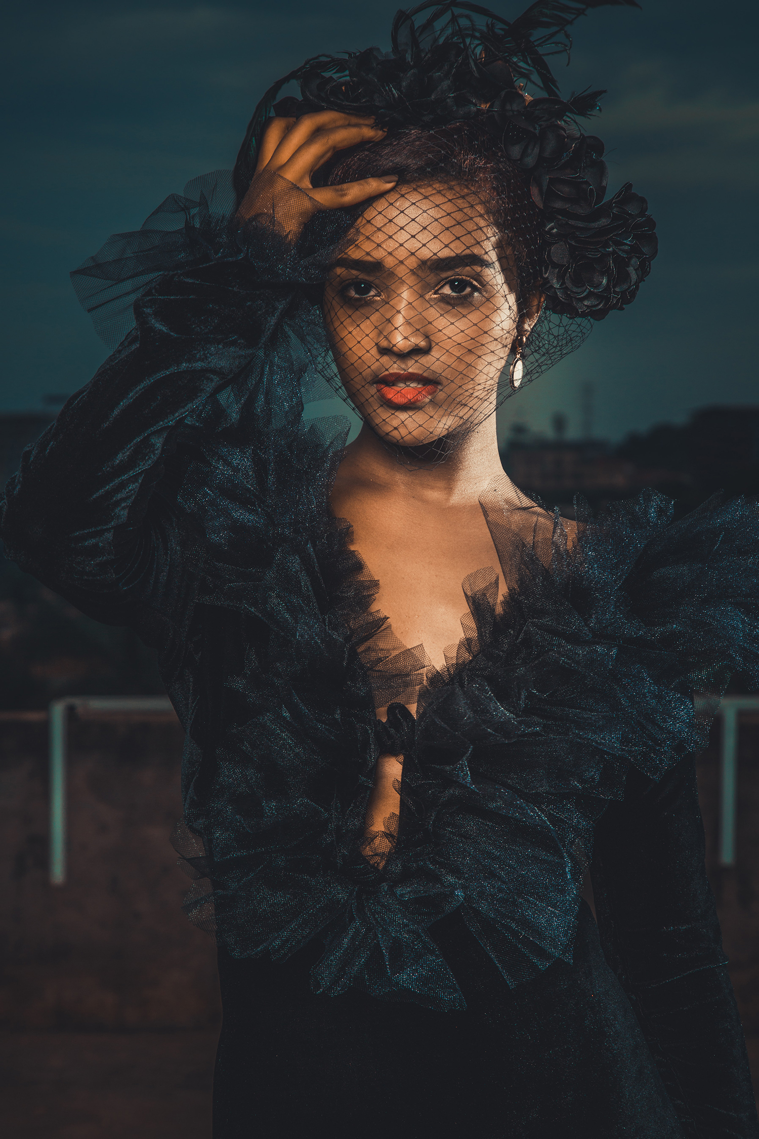 Woman wearing black frilly dress